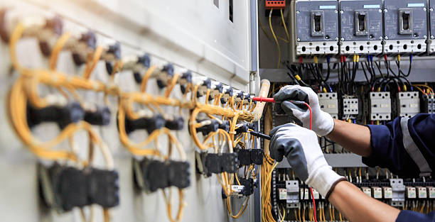 Professional Electrician technician working in Farr West, UT